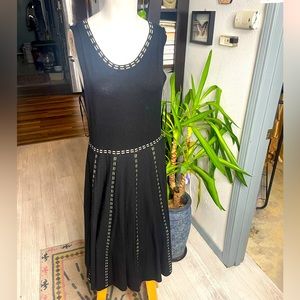 Stretchy black dress with gold details